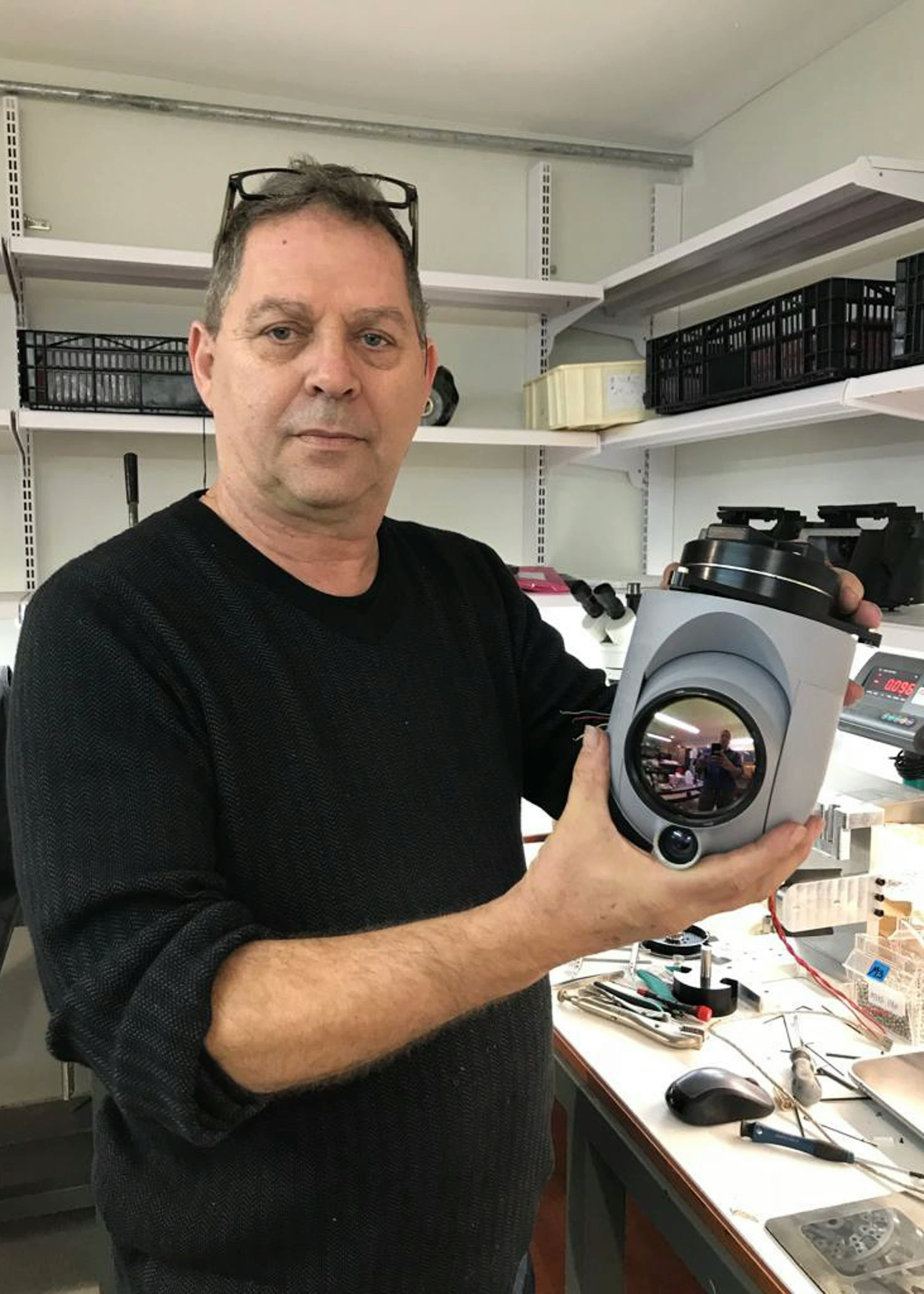 Sherwin (co-founder) holding a gimbal